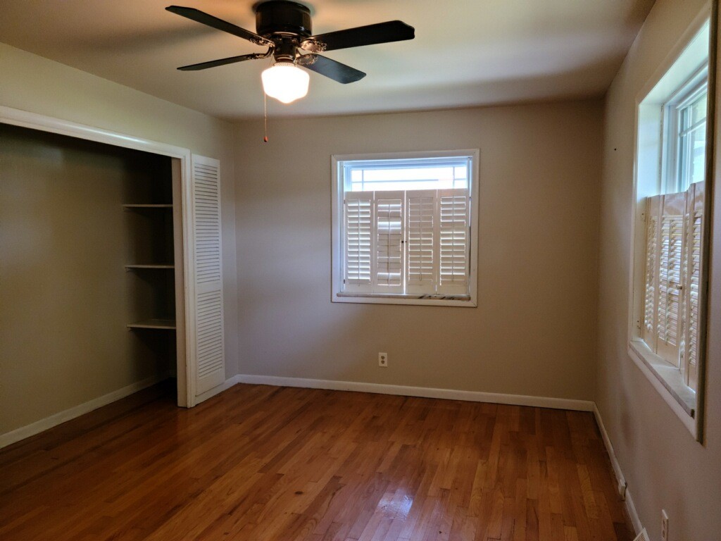 26 Morris Road Leoma, TN 38468 - Photo 12 of 13 a view of an empty room with wooden floor and a window