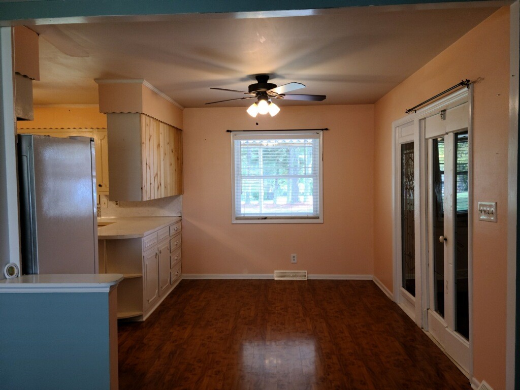 26 Morris Road Leoma, TN 38468 - Photo 6 of 13 wooden floor in an empty room with a window