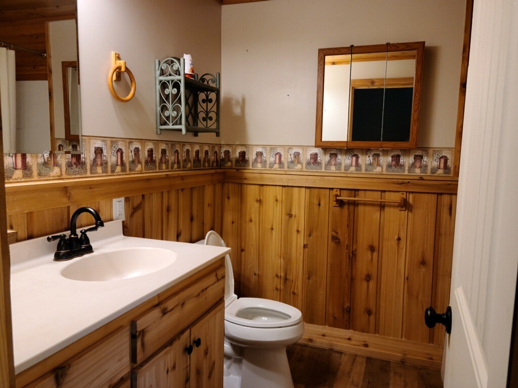 26 Morris Road Leoma, TN 38468 - Photo 8 of 13 a bathroom with a sink a toilet and mirror