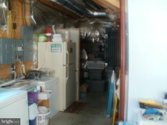 15063 Millbank Road King George, VA 22485 - Photo 28 of 29 Back area with heat pump-refrigerator xtra