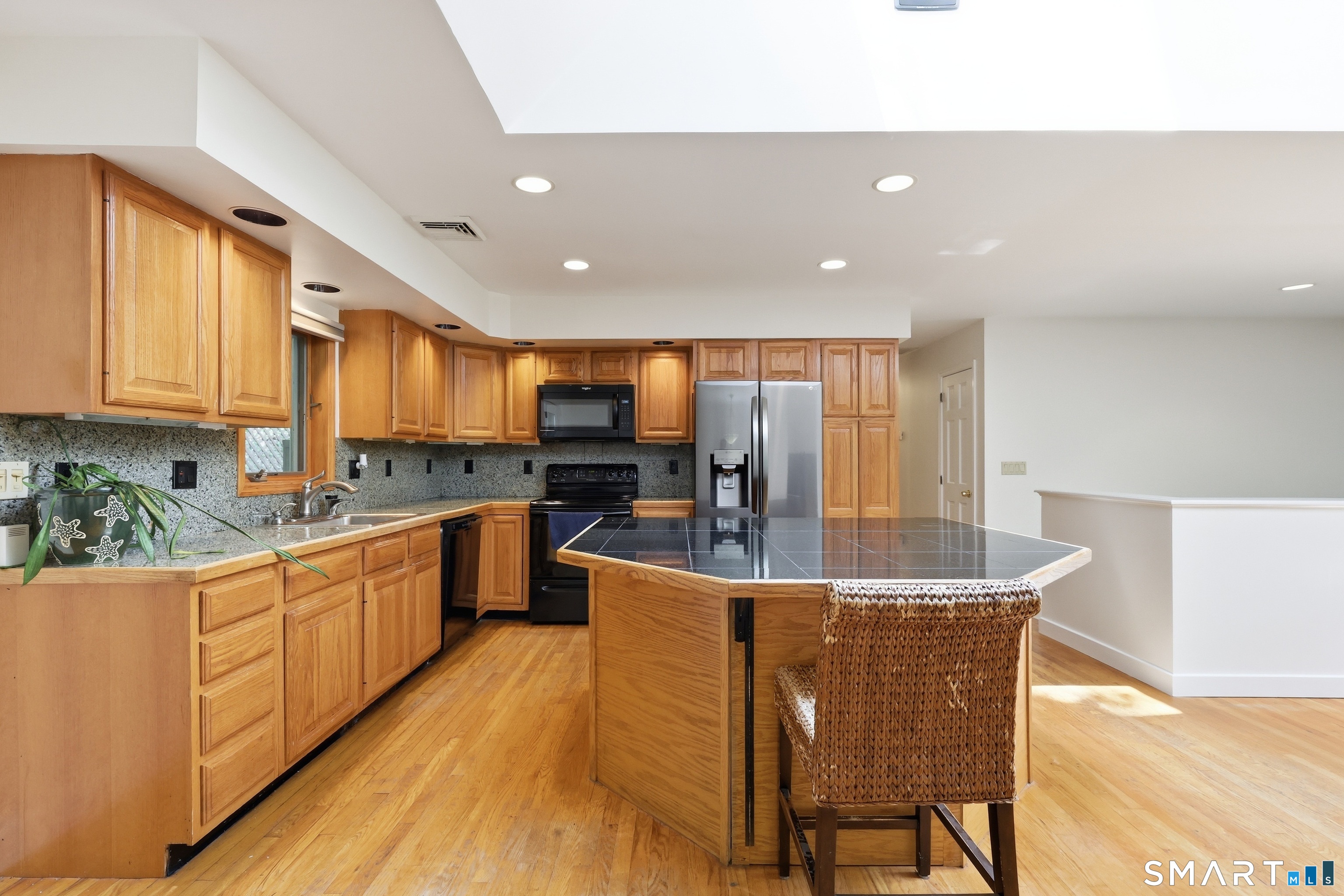 8 Old Bridge Road West New Fairfield, CT 06812 - Photo 6 of 35 Bright, open kitchen with seamless flow to the living and dining spaces.