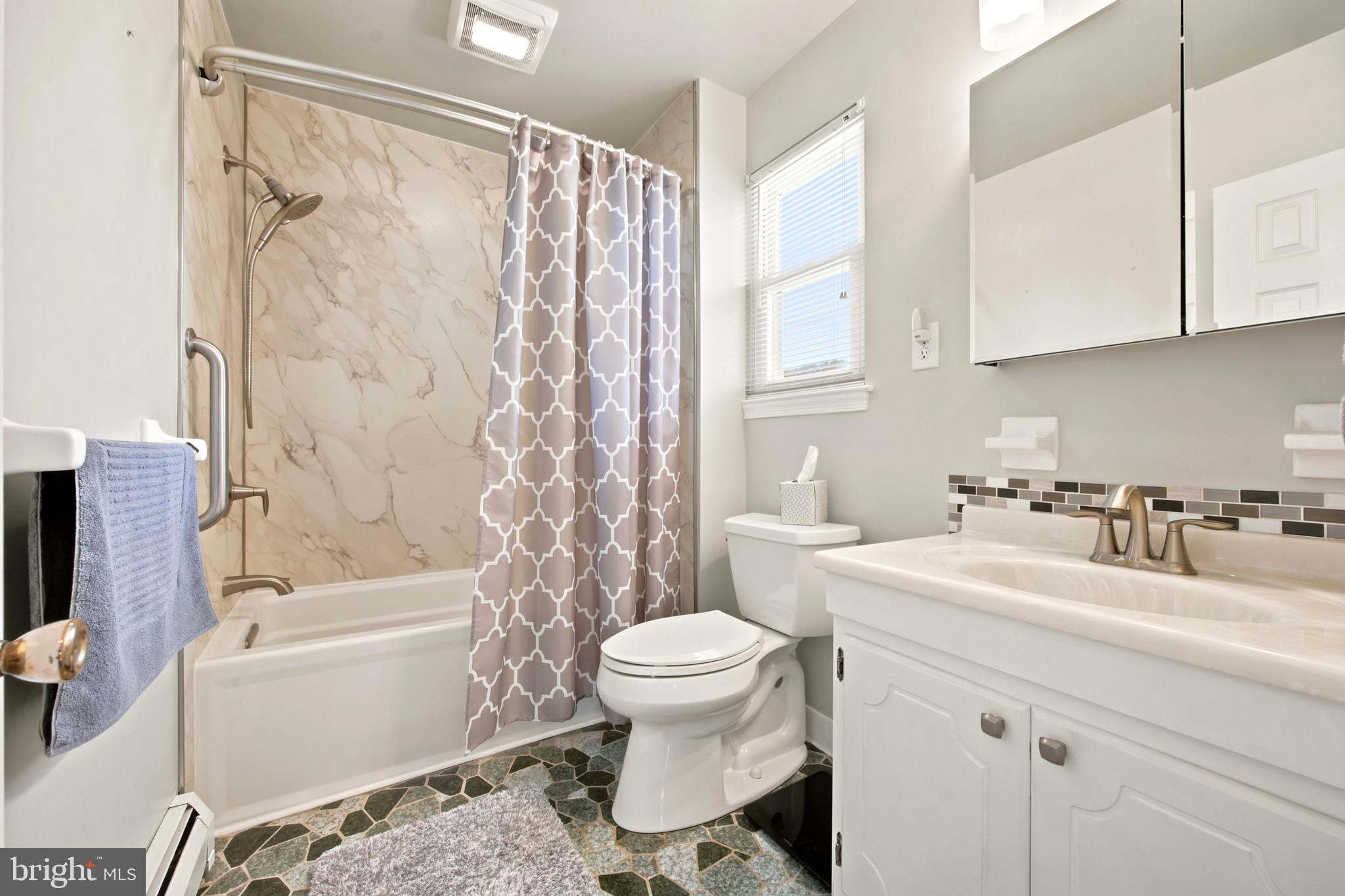 1004 Green Lane Secane, PA 19018 - Photo 29 of 49 a bathroom with a sink toilet and shower