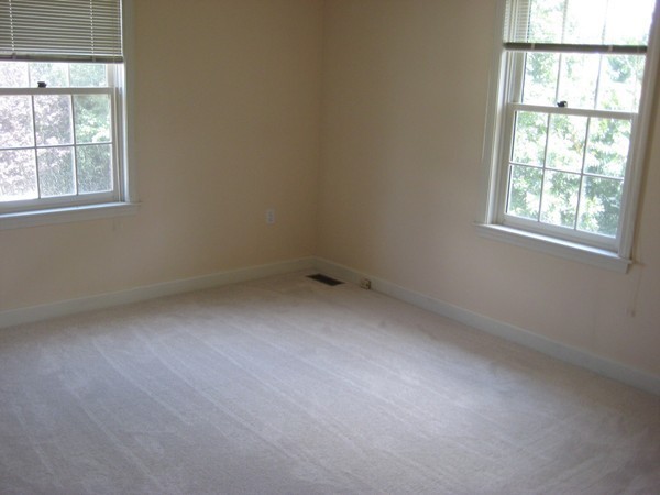 23 Stonegate Road Chelmsford, MA 01824 - Photo 9 of 15 an empty room with a window