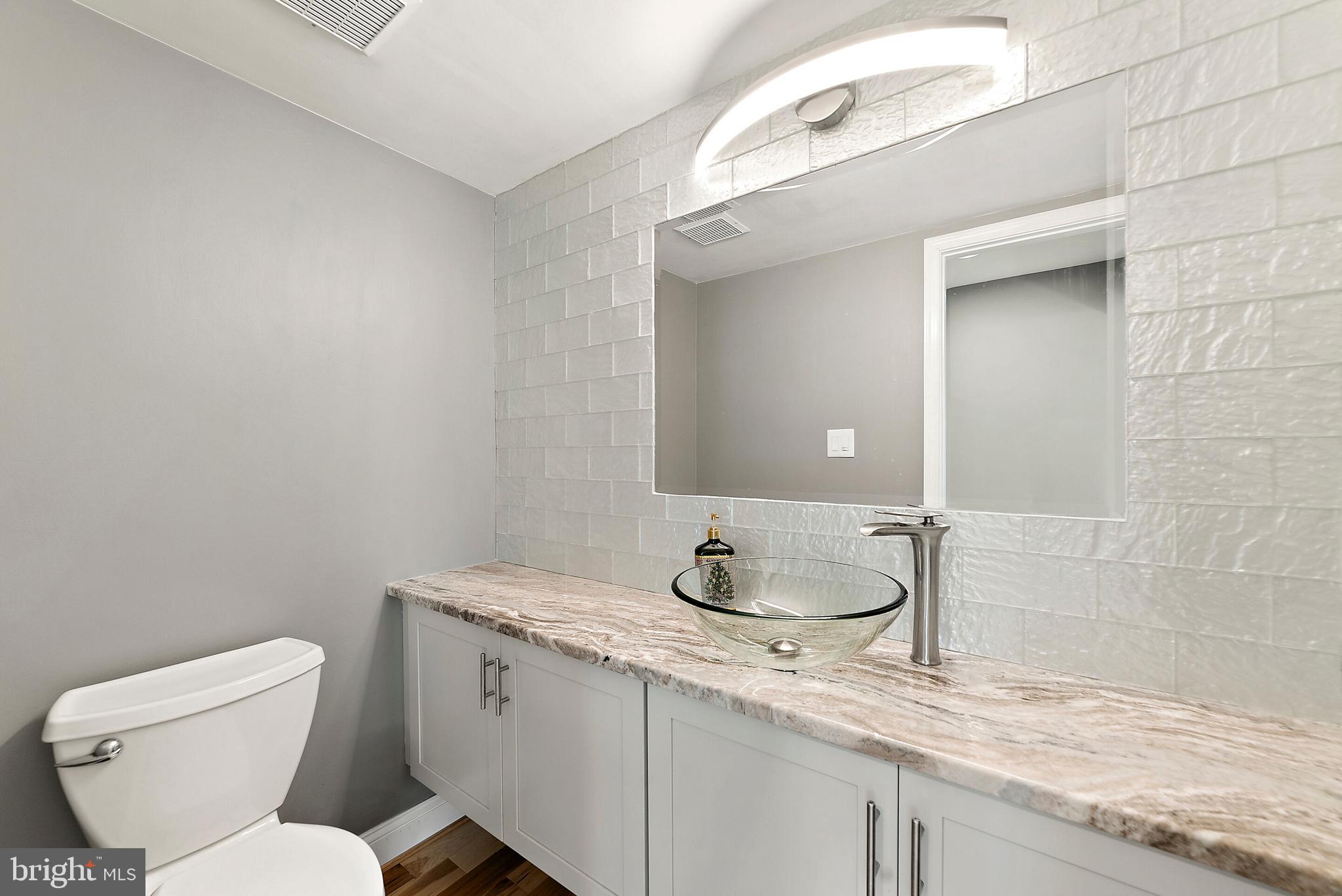1303 East Lee Road Sterling, VA 20164 - Photo 18 of 41 Half Bath on the Main Level