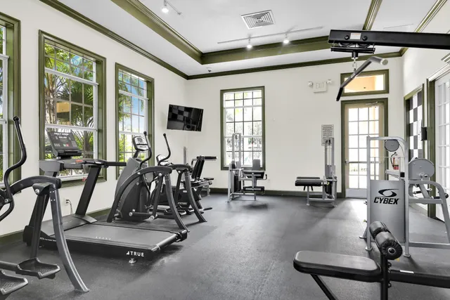 an aerial view of a house with a lake view