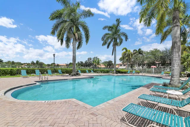 an aerial view of a house with garden space and outdoor space
