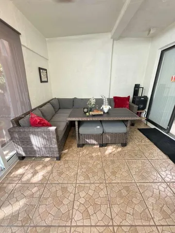 a living room with furniture and a couch