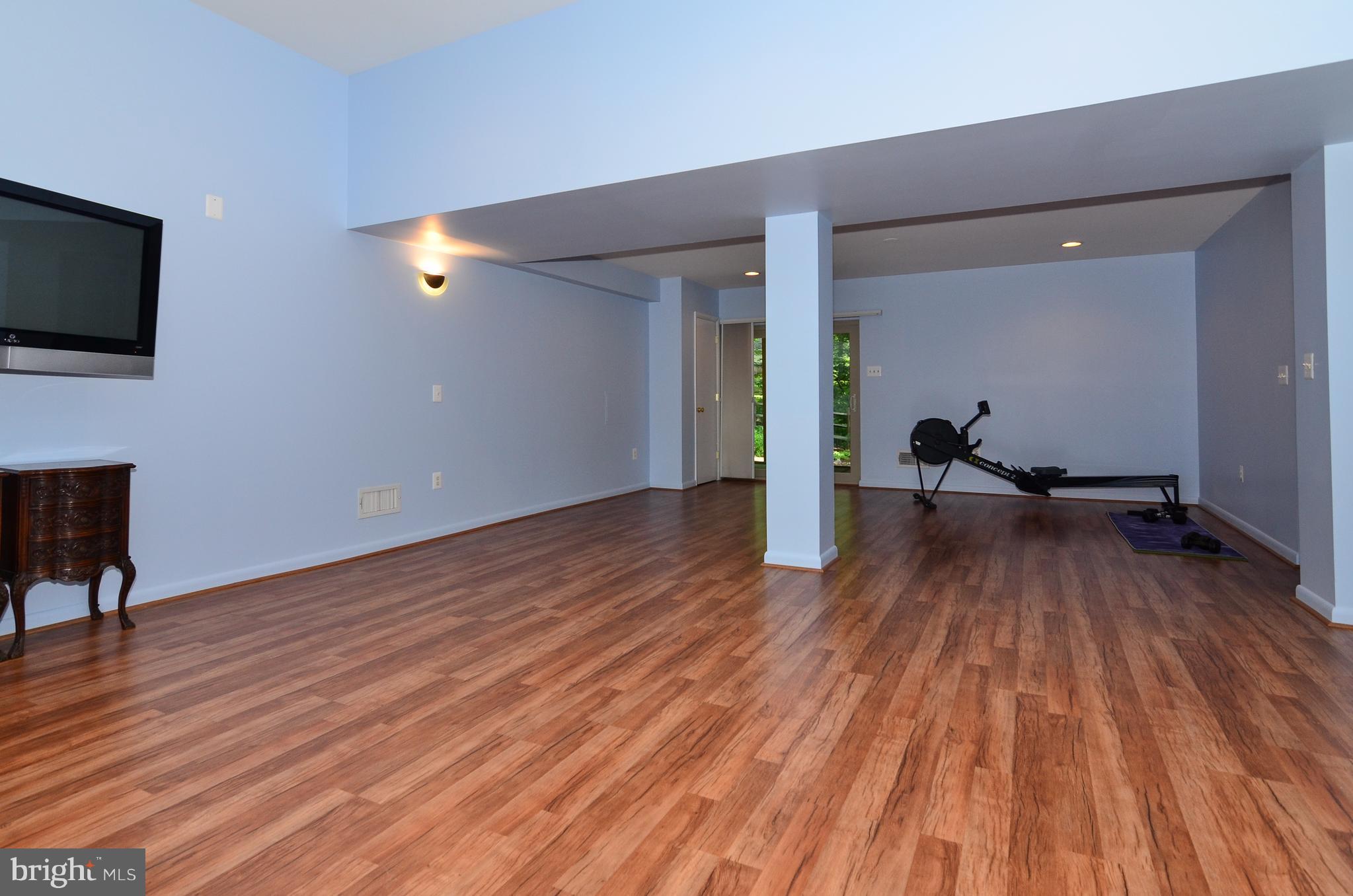 10920 Thanlet Lane Reston, VA 20190 - Photo 23 of 30 Beautiful Pergo Floors Throughout Walkout Basement