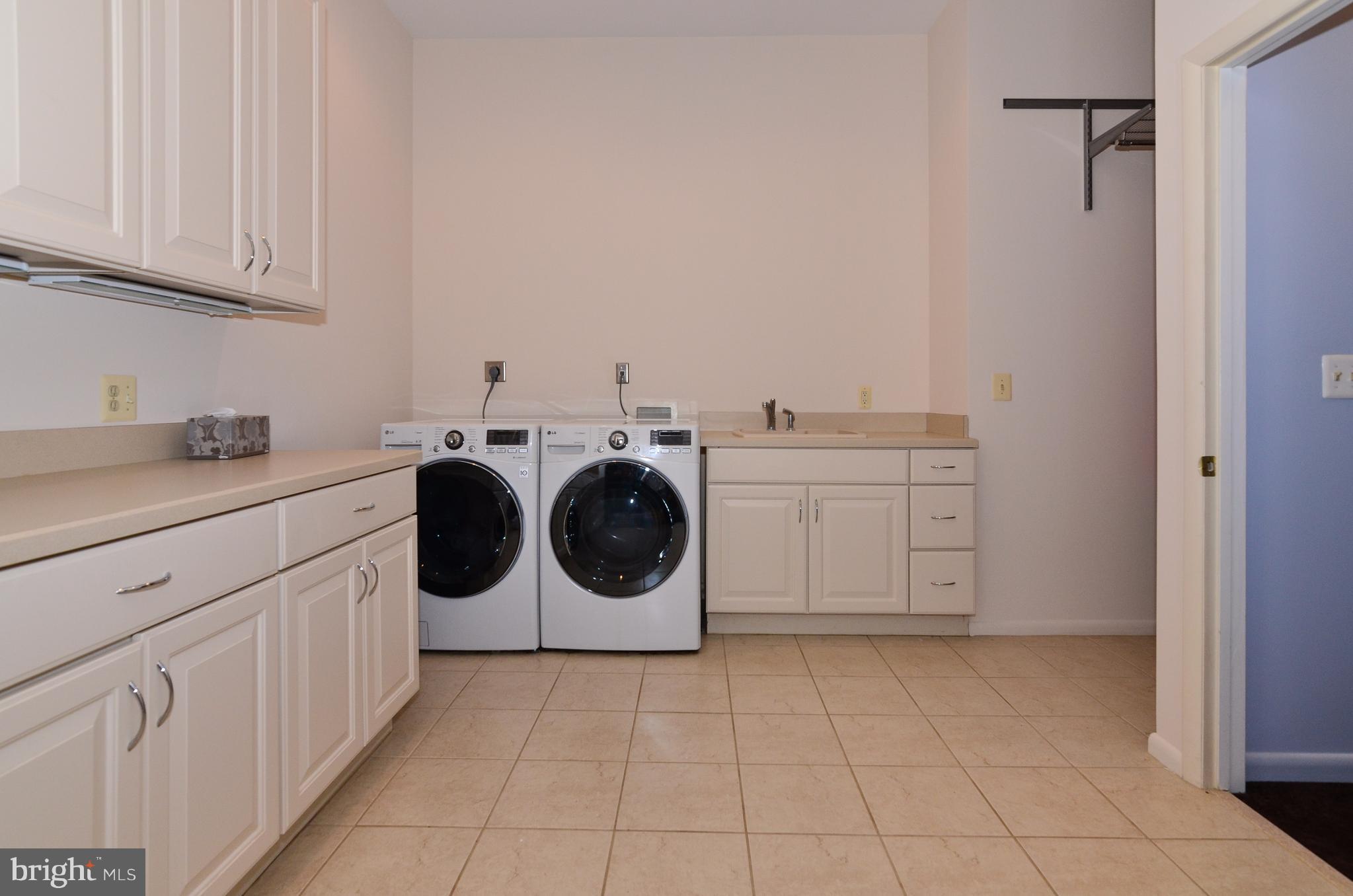 10920 Thanlet Lane Reston, VA 20190 - Photo 26 of 30 Huge Laundry/Craft Room w/Ample Storage.