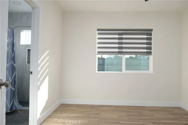 a view of bathroom with a large window