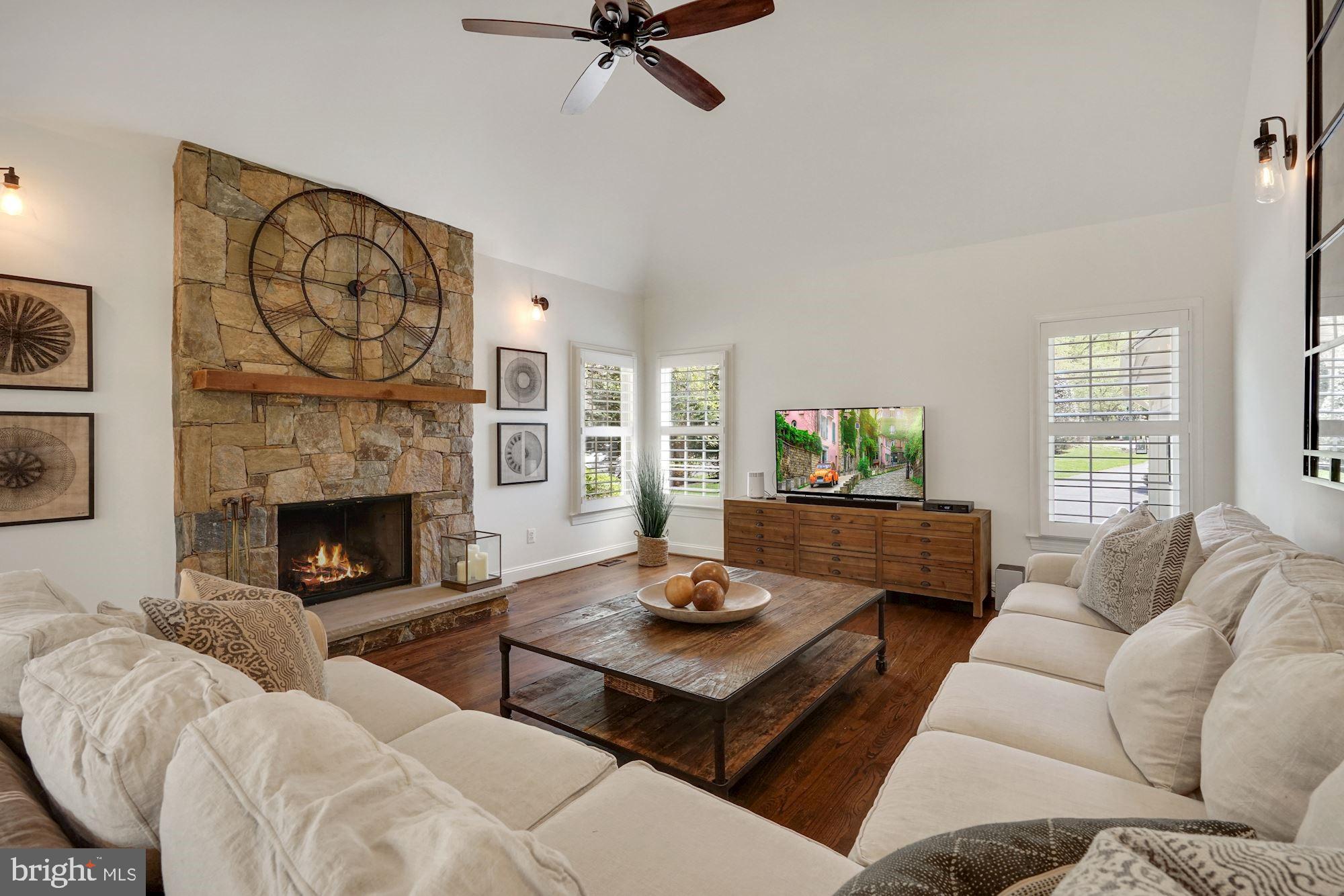 100 Chimney Ridge Place Sterling, VA 20165 - Photo 27 of 69 Cozy Family Rm w/gas, stone fpl & vaulted ceiling