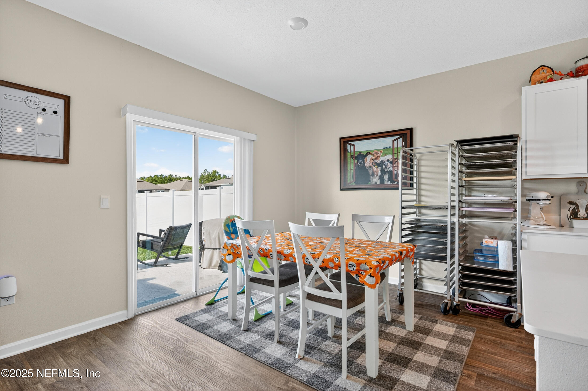 125 Hulett Wds Road Palm Coast, FL 32137 - Photo 14 of 40 a dining room with furniture and window
