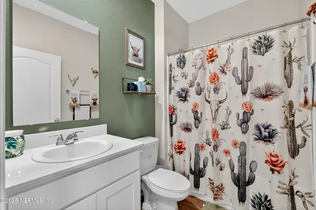 a bathroom with a sink and a toilet