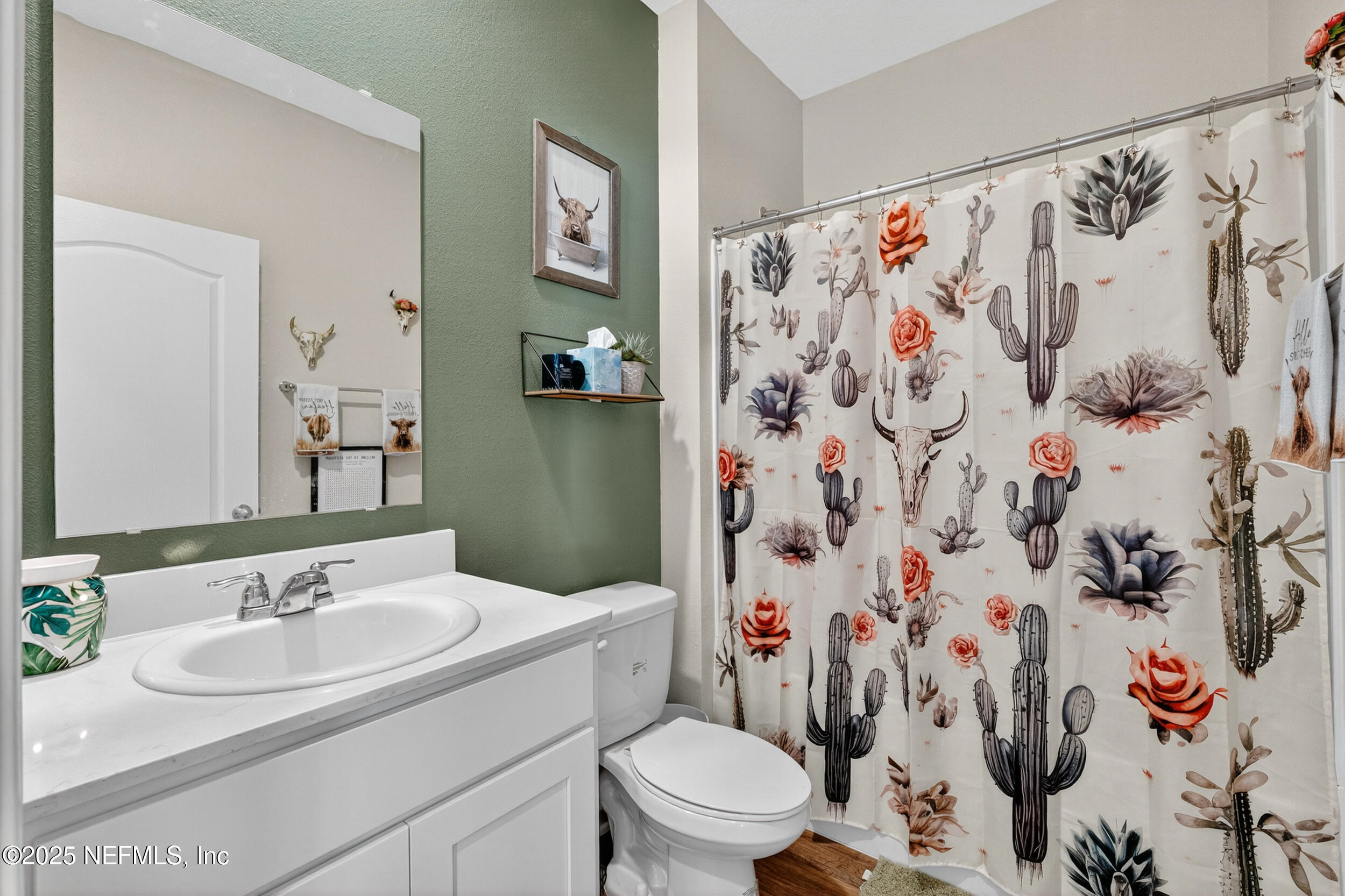 125 Hulett Wds Road Palm Coast, FL 32137 - Photo 19 of 40 a bathroom with a sink and a toilet