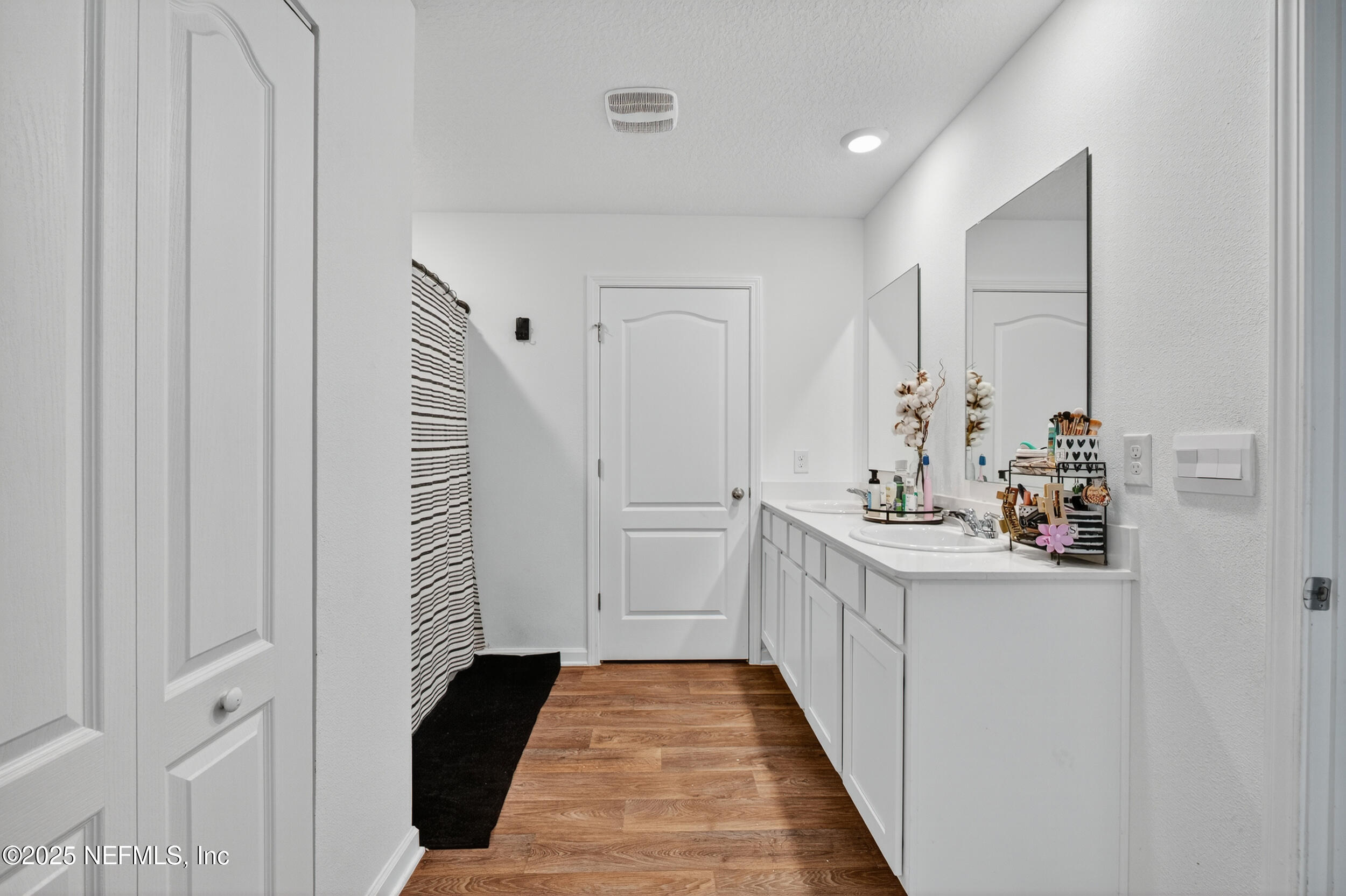 125 Hulett Wds Road Palm Coast, FL 32137 - Photo 25 of 40 a kitchen with sink and cabinets