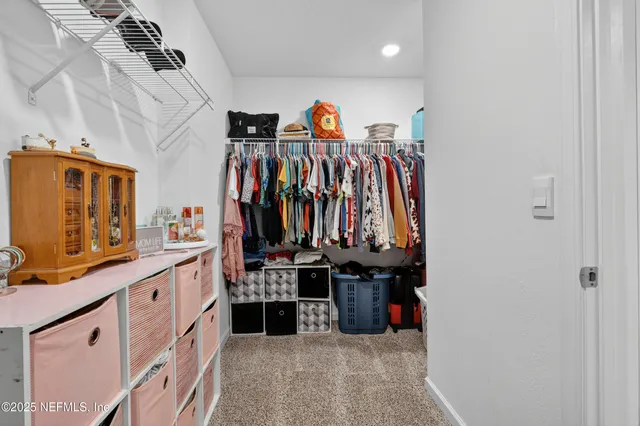 a view of a walk in closet
