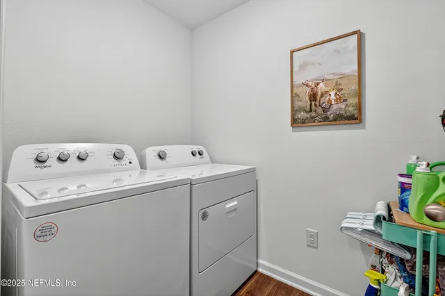 a utility room with dryer and washer
