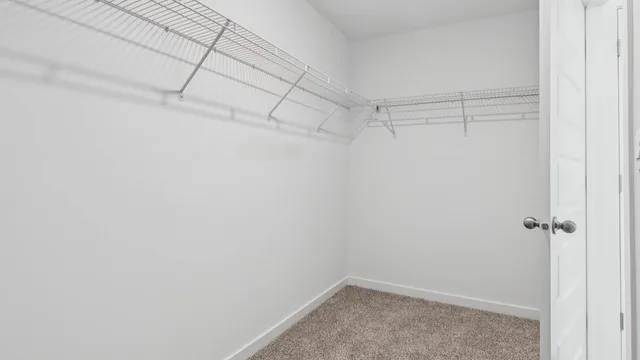 a view of a room with racks on the wall