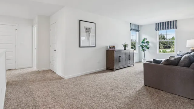 a living room with furniture and window