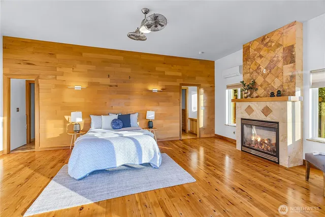 a bathroom with a tub sink and shower