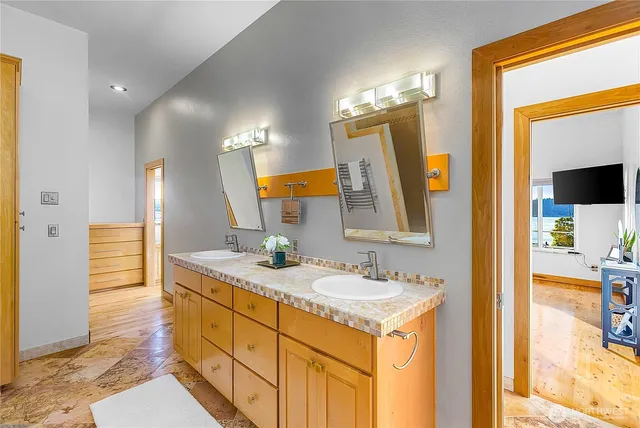 a view of a hallway with washer and dryer