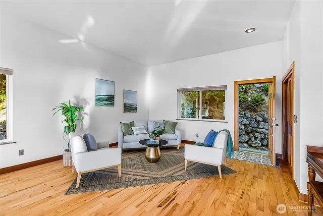 a view of a dining room with furniture window and outside view