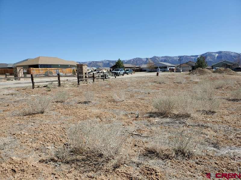 555 East 7th Street Cortez, CO 81321 - Photo 2 of 7 a view of a yard with an outdoor space