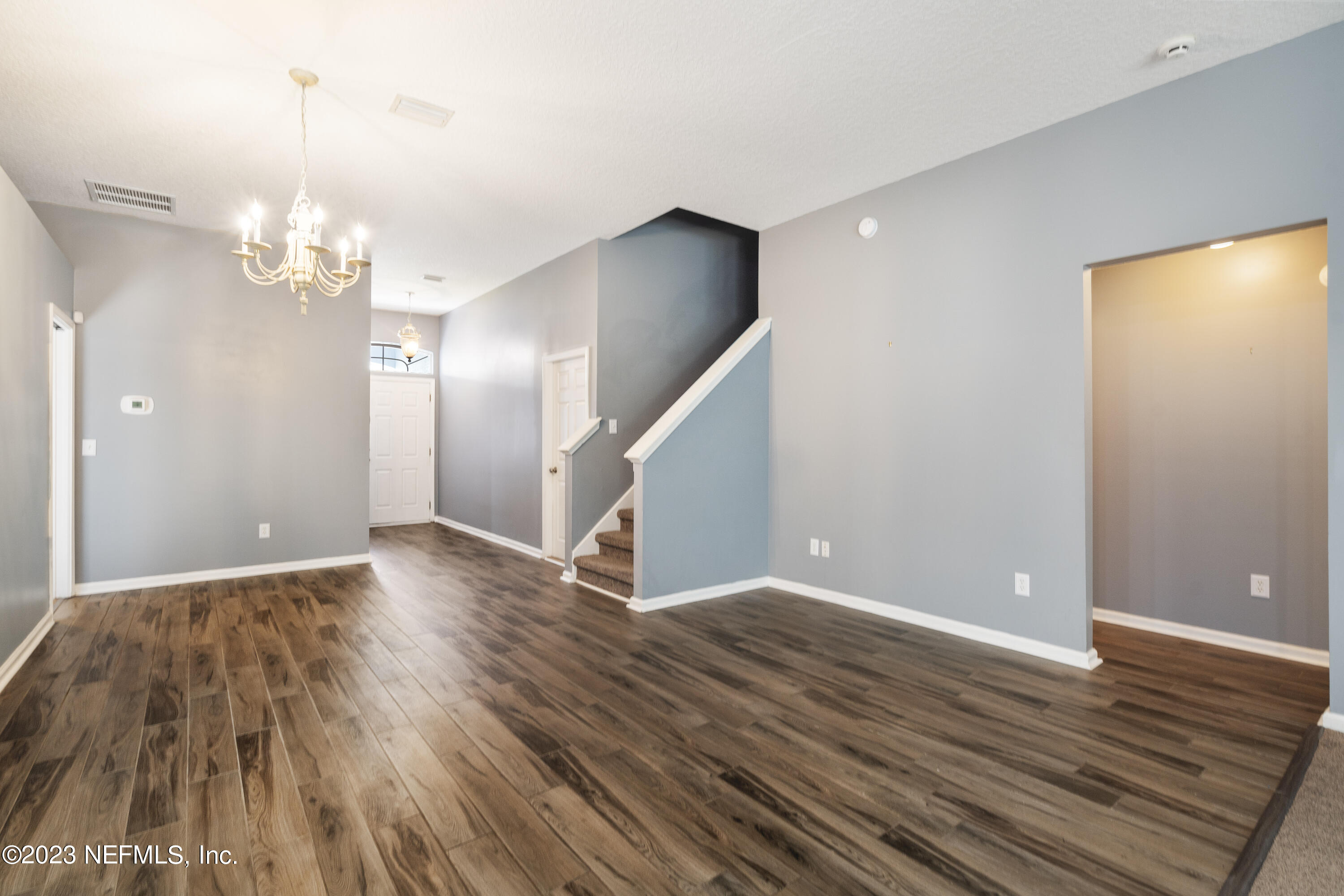 312 West Tropical Trace St. Johns, FL 32259 - Photo 14 of 57 a view of a livingroom with wooden floor