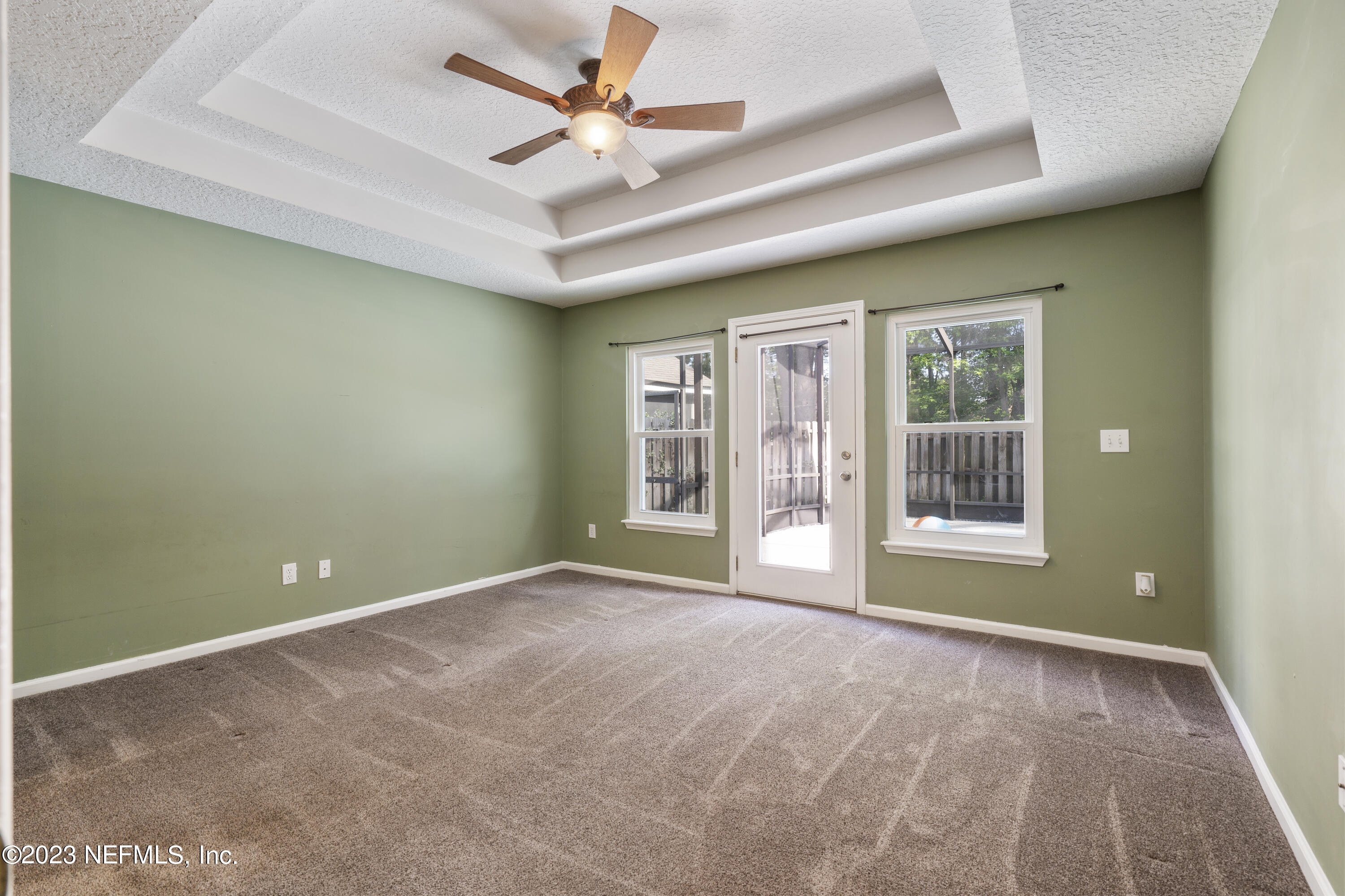 312 West Tropical Trace St. Johns, FL 32259 - Photo 22 of 57 a view of an empty room with a window