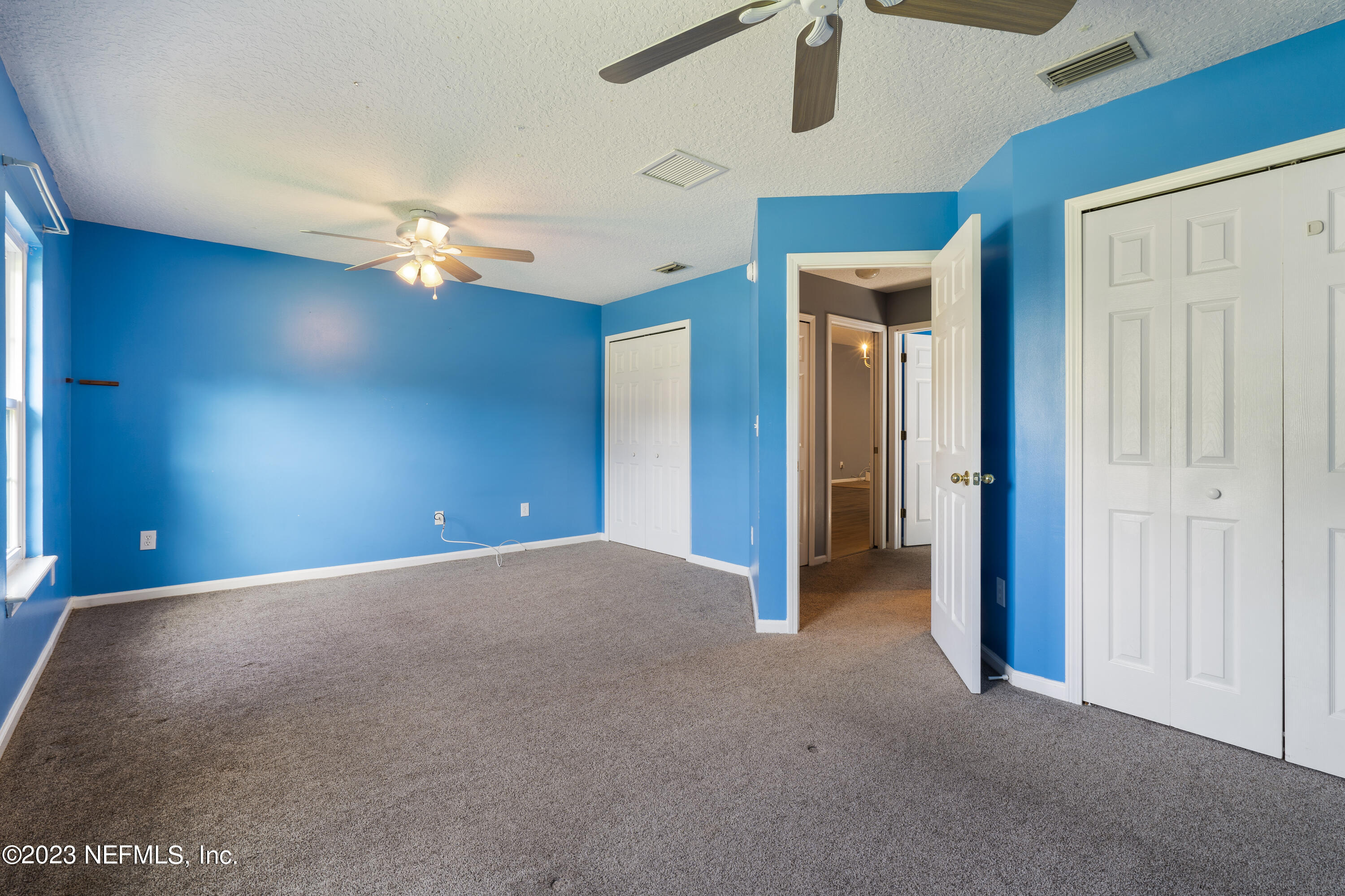 312 West Tropical Trace St. Johns, FL 32259 - Photo 27 of 57 a view of a livingroom with a ceiling fan