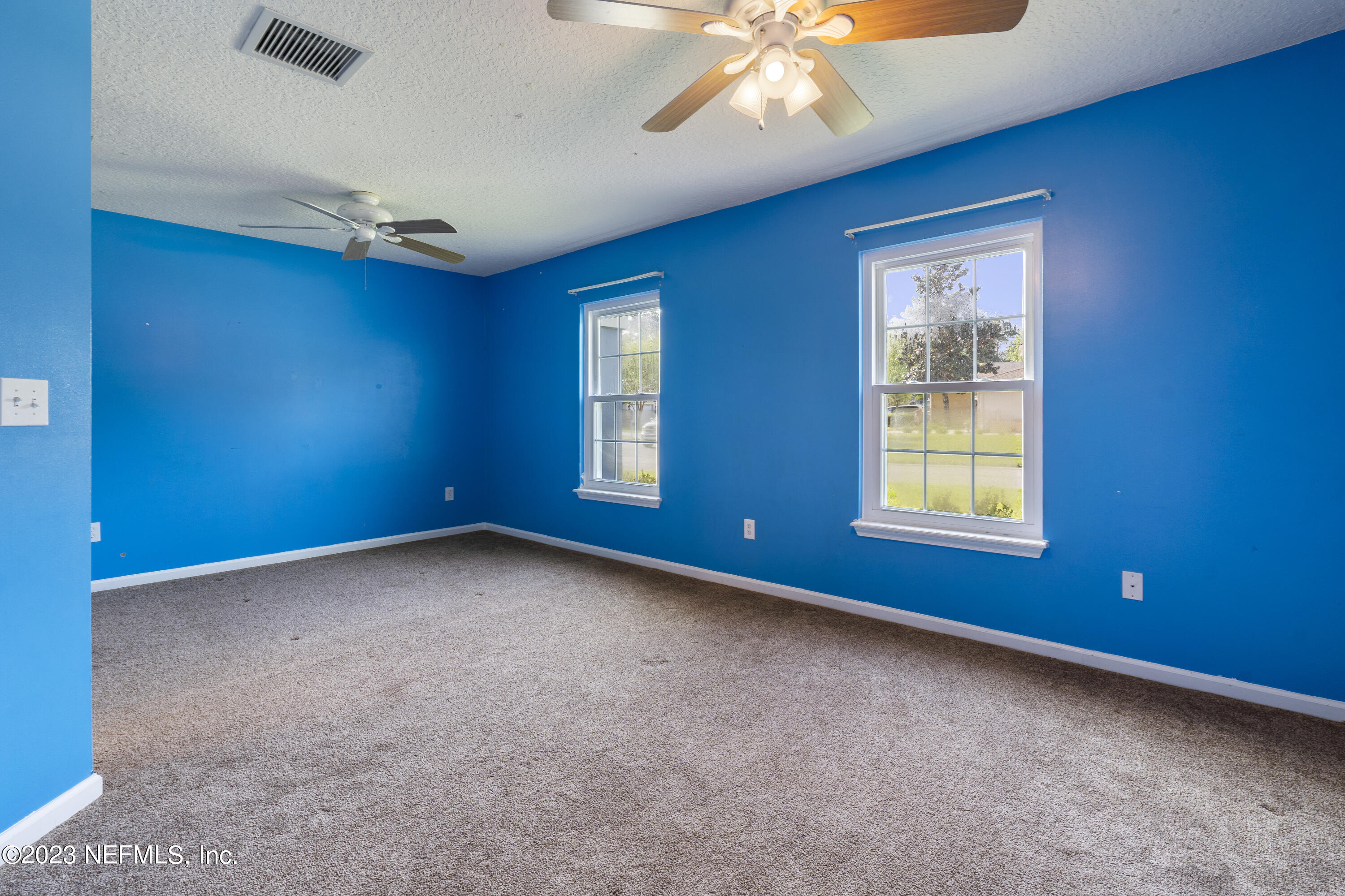 312 West Tropical Trace St. Johns, FL 32259 - Photo 28 of 57 a view of an empty room with a window