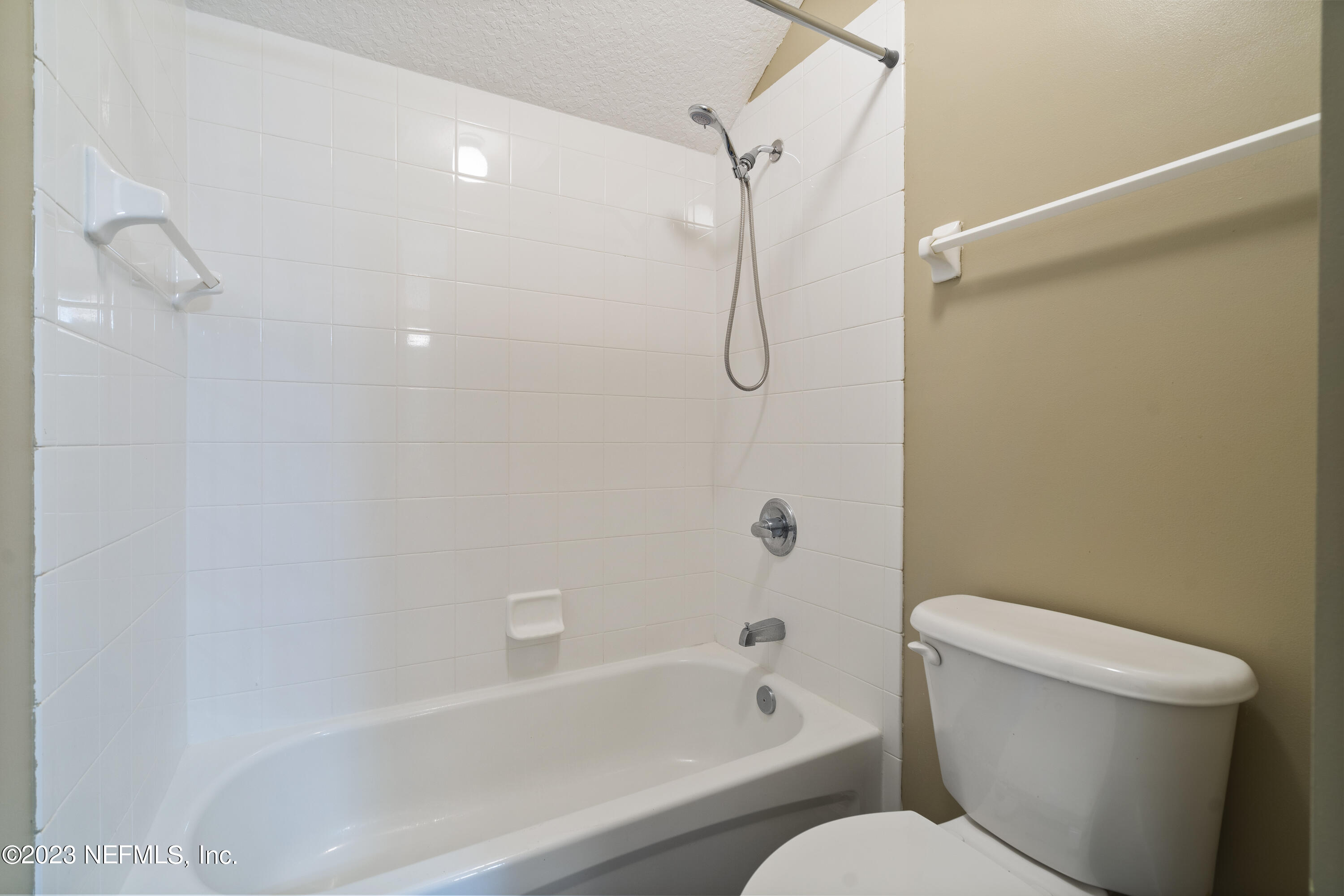 312 West Tropical Trace St. Johns, FL 32259 - Photo 34 of 57 a bathroom with a toilet and a bathtub