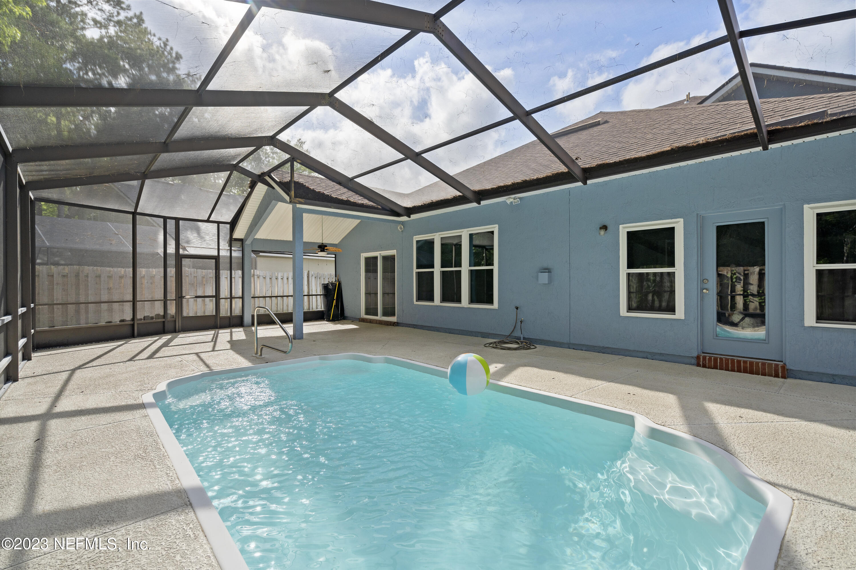 312 West Tropical Trace St. Johns, FL 32259 - Photo 38 of 57 a view of a house with backyard and sitting area