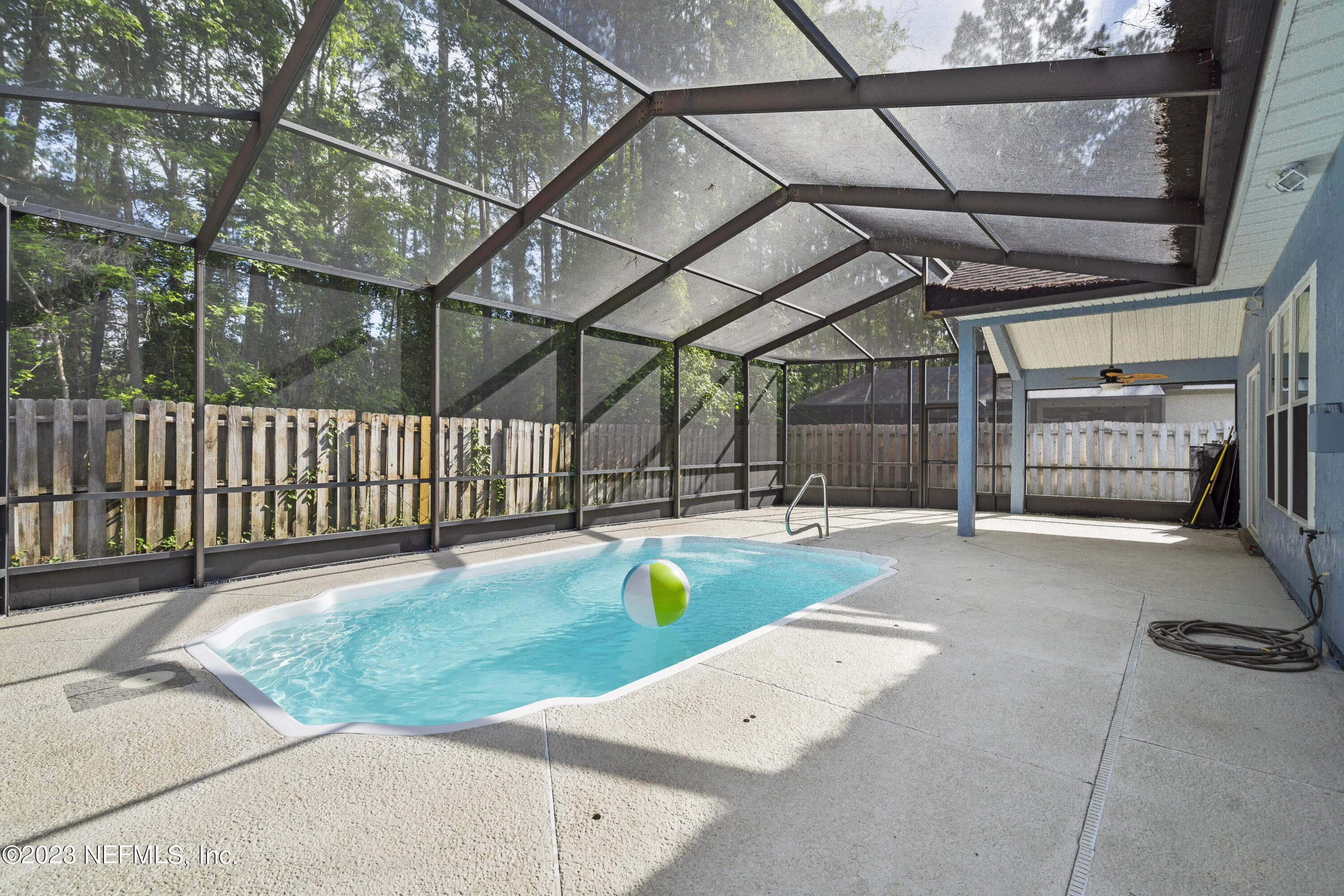 312 West Tropical Trace St. Johns, FL 32259 - Photo 39 of 57 a view of yard with a tub and wooden fence