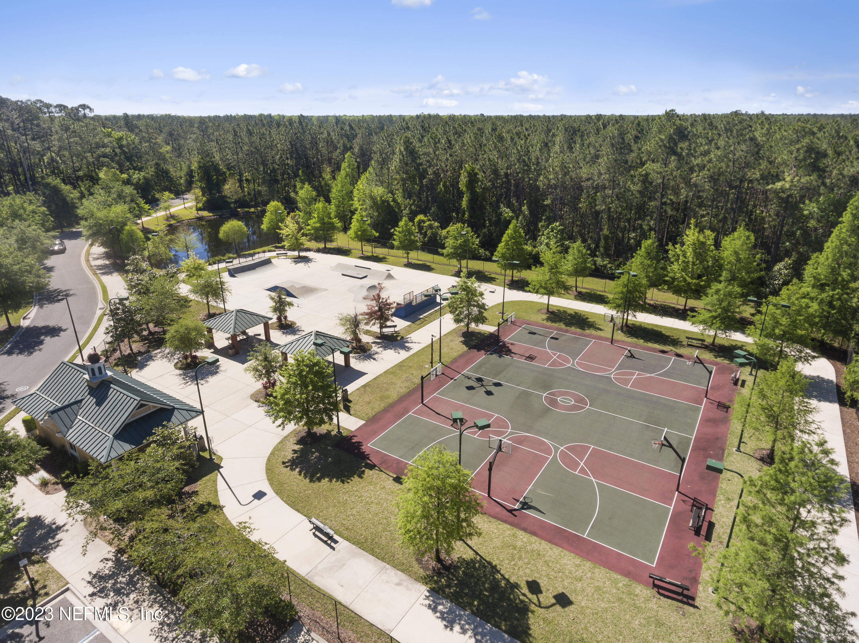 312 West Tropical Trace St. Johns, FL 32259 - Photo 47 of 57 an aerial view of a house with a yard basket ball court and outdoor seating