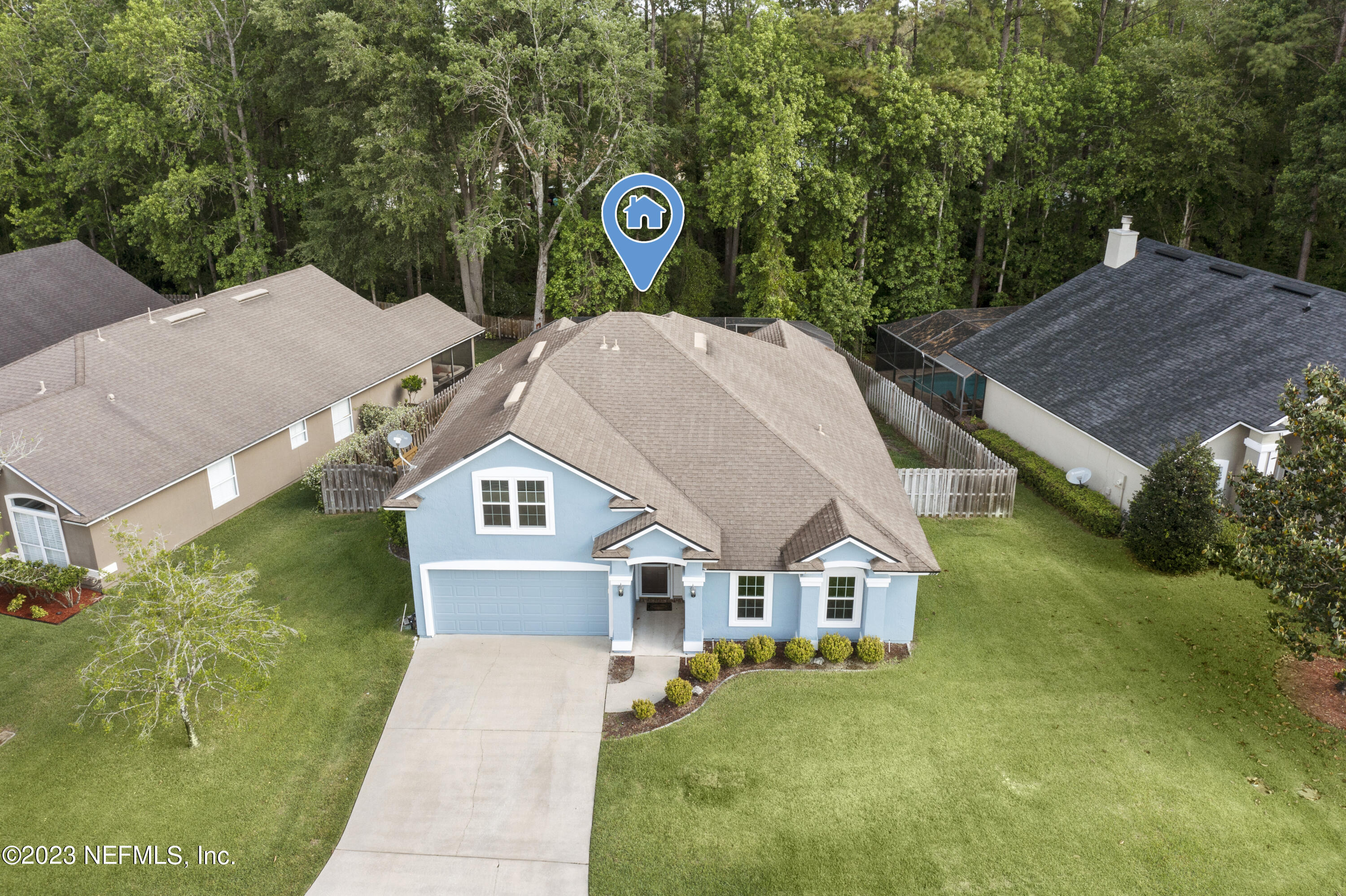 312 West Tropical Trace St. Johns, FL 32259 - Photo 5 of 57 a aerial view of a house next to a yard with green space