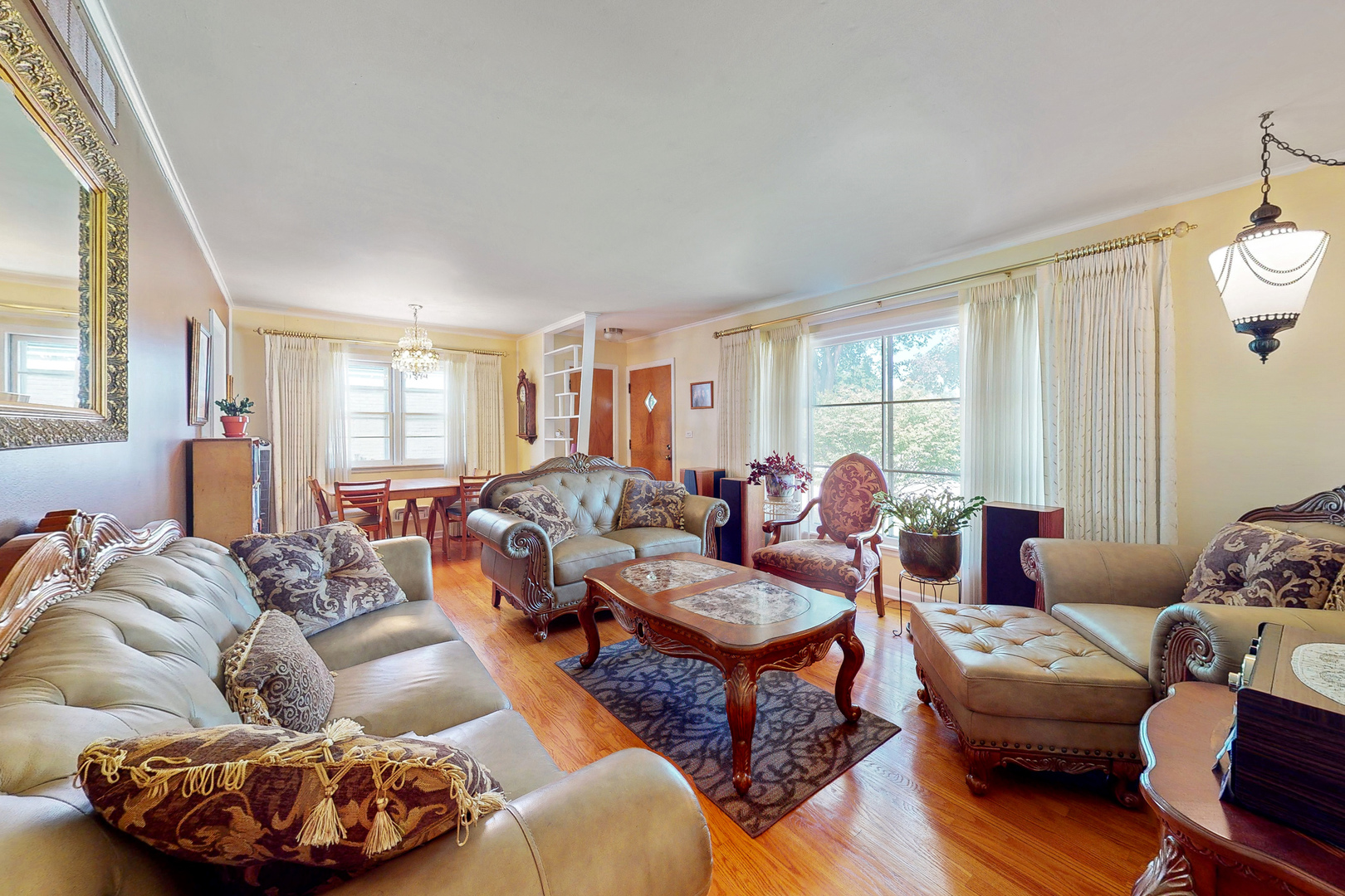 1305 Wayne Drive Des Plaines, IL 60018 - Photo 2 of 25 a living room with furniture and a large window