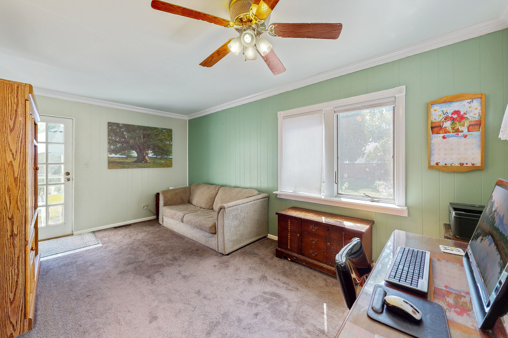 1305 Wayne Drive Des Plaines, IL 60018 - Photo 7 of 25 a living room with furniture and a window