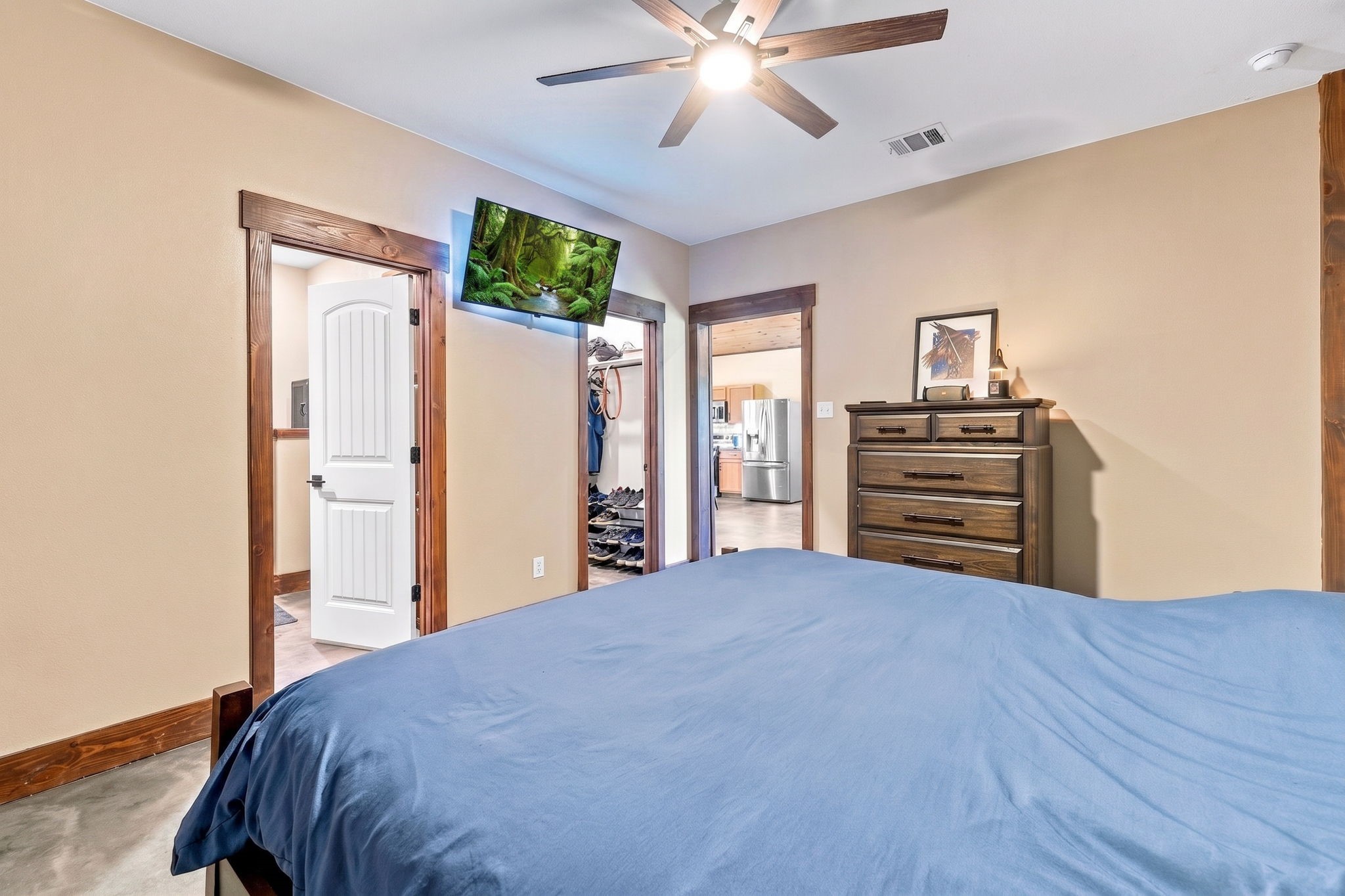 1383 Tram Road Livingston, TX 77351 - Photo 23 of 49 Primary bedroom with a walk in closet