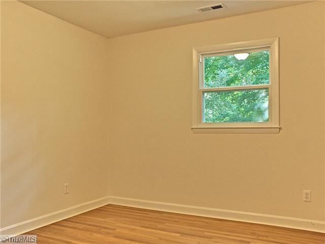 5731 Enfield Road Pfafftown, NC 27040 - Photo 11 of 16 2nd Bedroom.