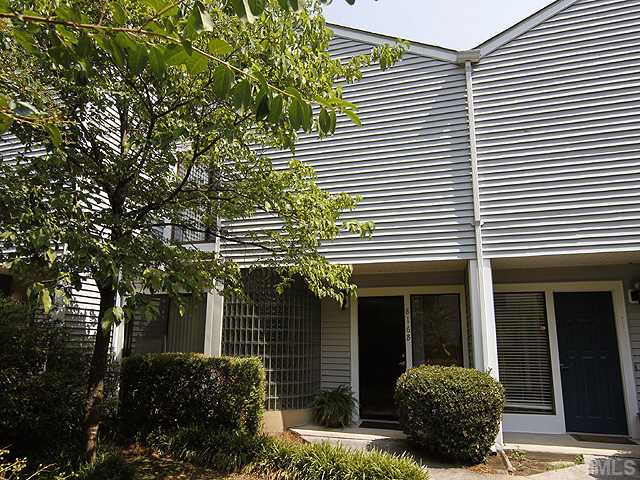 816 Berkeley Street, Unit B Durham, NC 27705 - Photo 1 of 12 a front view of a house with plants