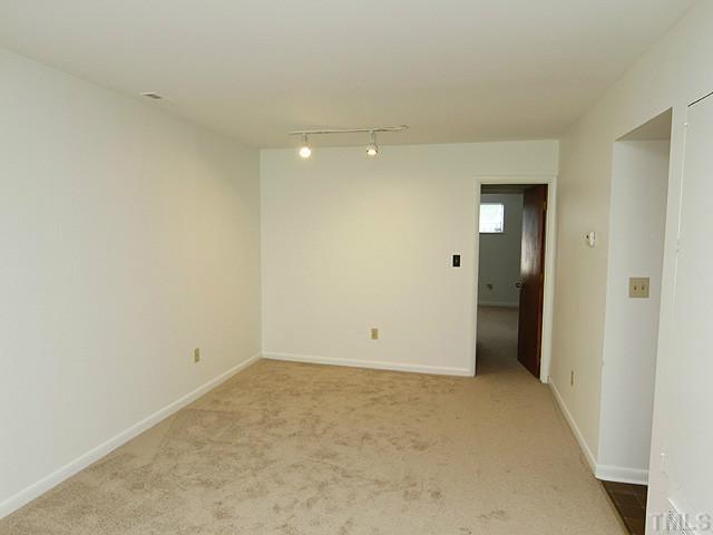 816 Berkeley Street, Unit B Durham, NC 27705 - Photo 4 of 12 wooden floor in an empty room