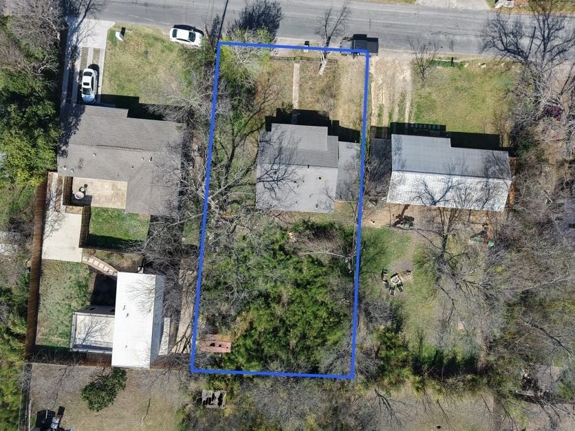 Aerial overview of property's location featuring property boundaries highlighted