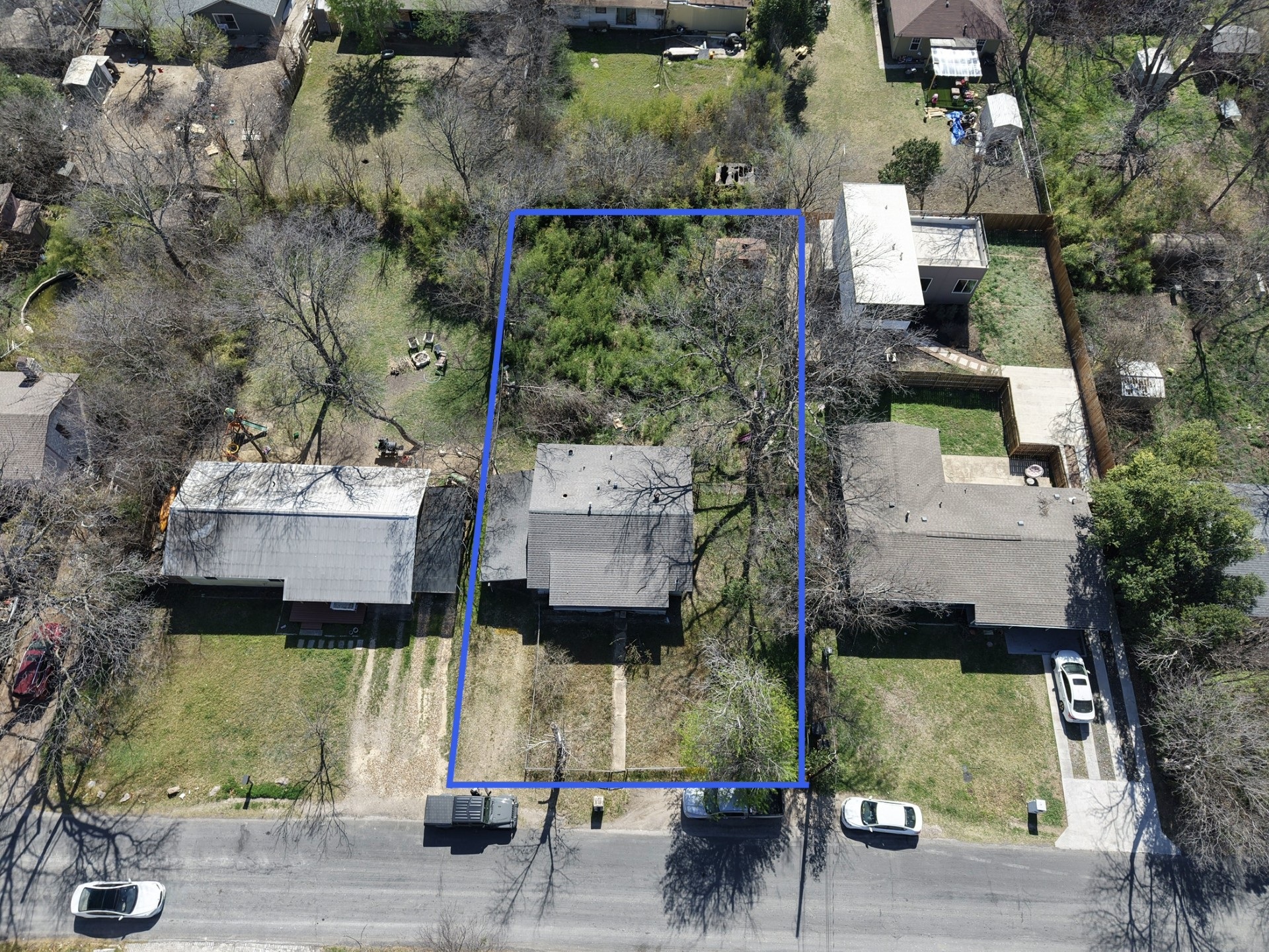 407 Middle Lane Austin, TX 78753 - Photo 2 of 17 Aerial perspective of suburban area with approximate property boundaries highlighted