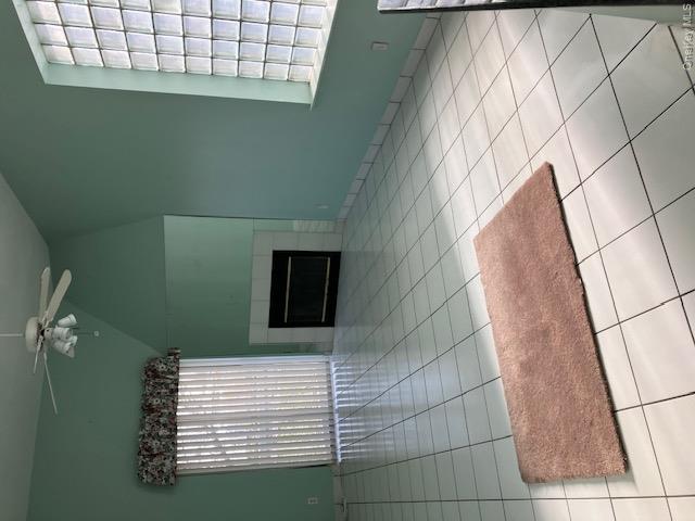 170 Schofield Street, Unit 2I Bronx, NY 10464 - Photo 11 of 17 a view of livingroom with furniture and window
