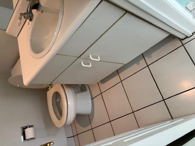 170 Schofield Street, Unit 2I Bronx, NY 10464 - Photo 13 of 17 a bathroom with a sink and toilet