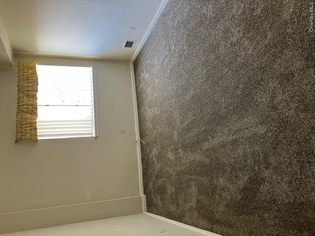 170 Schofield Street, Unit 2I Bronx, NY 10464 - Photo 8 of 17 an empty room with a window