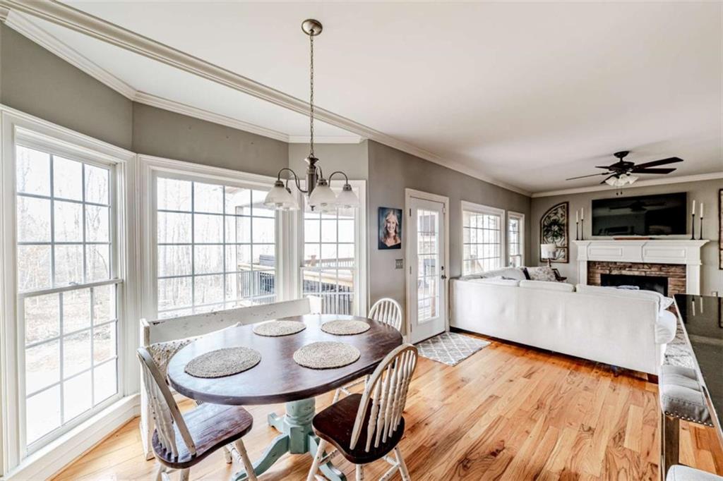 15 Quarter Horse Drive Northwest Rome, GA 30165 - Photo 16 of 57 a view of a dining room with furniture window and wooden floor