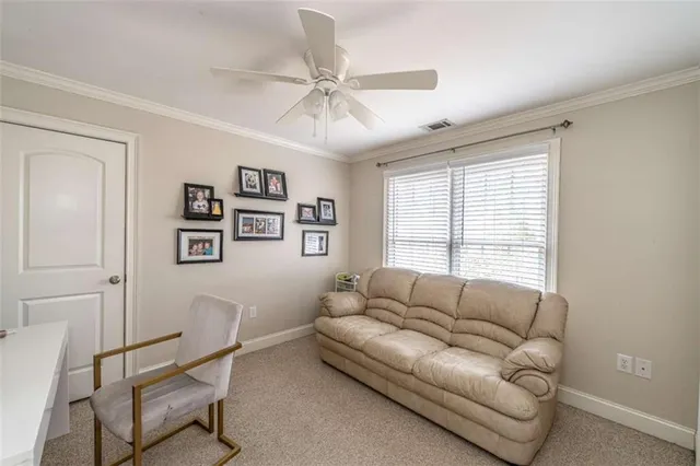 a living room with furniture and a couch