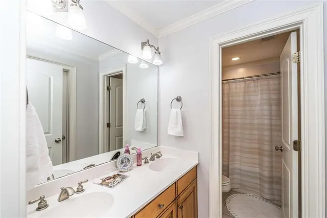 a room with lots of wooden furniture and cabinets